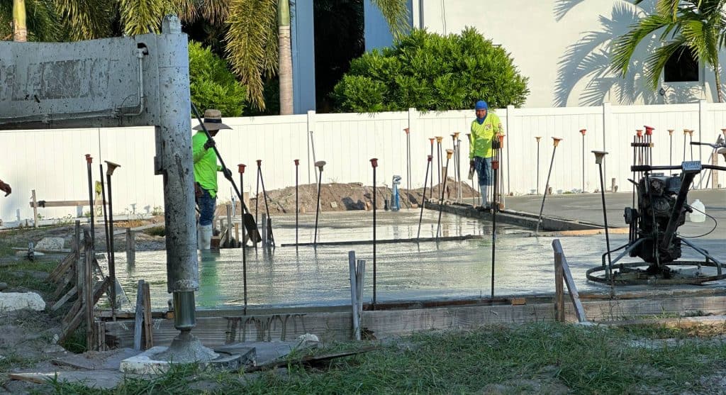 The Foundation concrete slab pour detail workers person steel