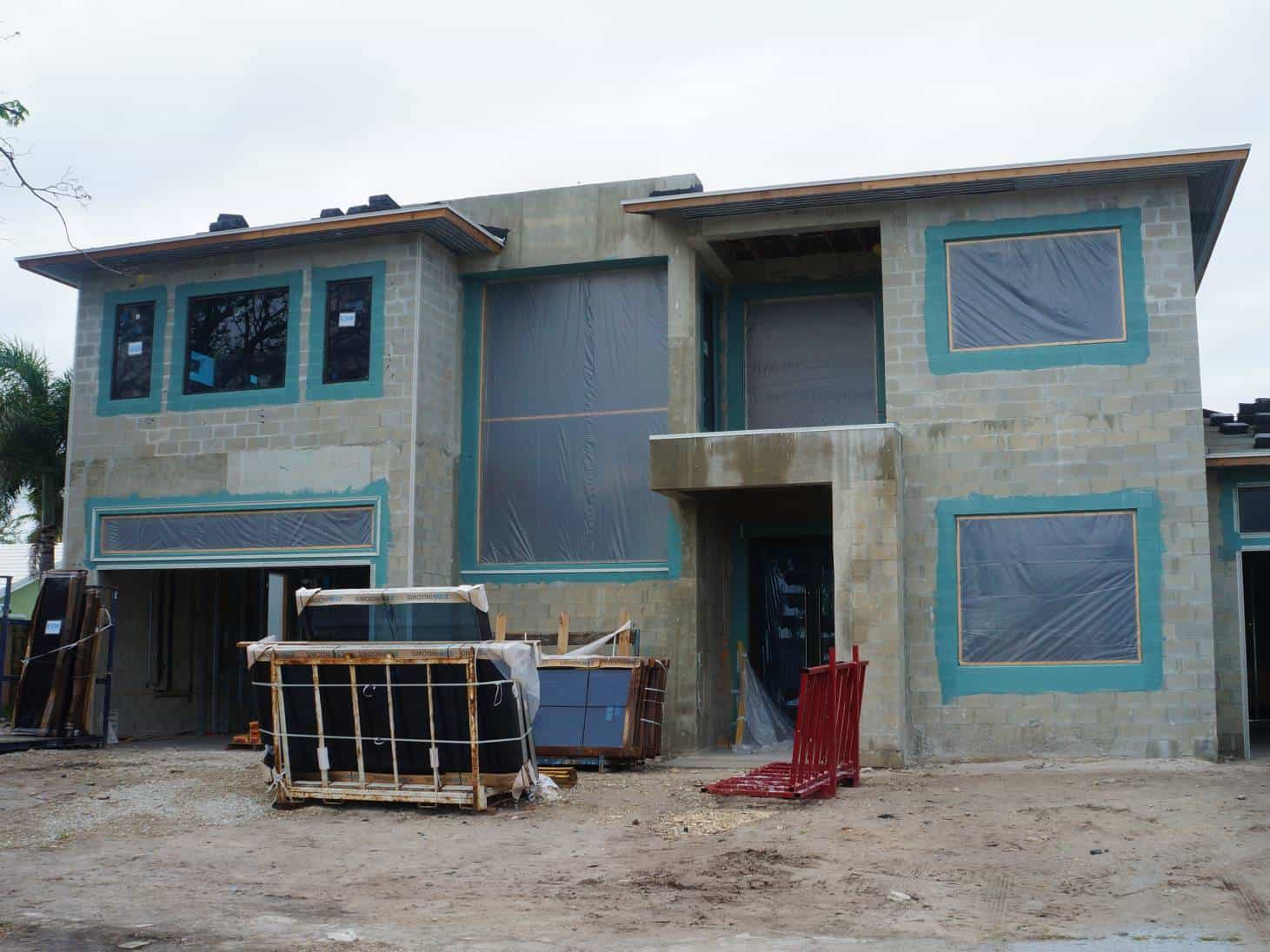 2 stroy masonry construction with windows installed