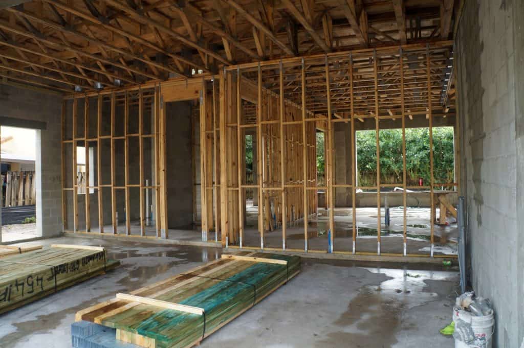 interior wood framed walls in masonry construction